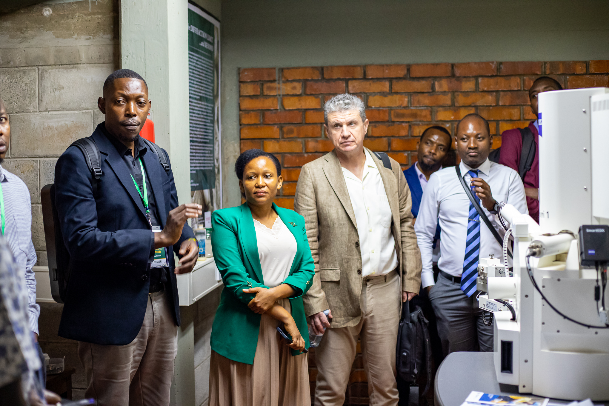 SUNRISE team observing research equipment in laboratory